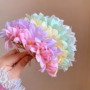 Elegant pink floral hair pin with colorful silk flowers for traditional women hair styling