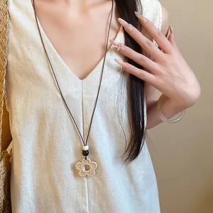 Bohemian woven flower pendant necklace with wax cord and beads