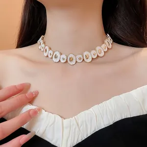 Elegant vintage irregular white enamel round choker necklace with gold metallic accents for women
