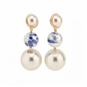 Vintage style three-tier drop earrings with blue ceramic and cream pearl beads