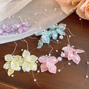 Elegant zircon flower petal earrings with pearl tassels in assorted soft pastel colors.