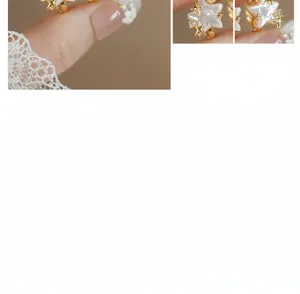 Macro view of chic pink star-shaped pearl earrings with gold finish and crystal details