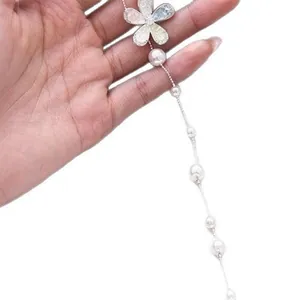 Elegant fashion necklace featuring a sparkling zircon flower pendant and pearl bead chain