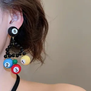 Trendy billiard ball beaded triangle drop earrings featuring numbers 8, 2, 3, and 1.