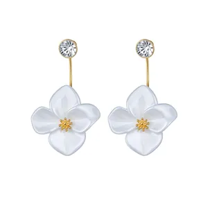 Elegant white resin flower earrings with 18k gold plating and sparkling crystal accents