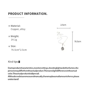 Detailed product information for a round key pendant necklace showing size and materials