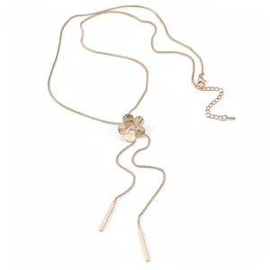 Elegant gold flower tassel necklace with crystal center, French minimalist sweater chain