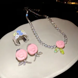 Sparkling zircon and resin flower jewelry set including necklace, ring, and earrings