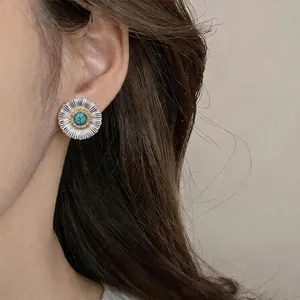 Vintage 925 silver needle stud earrings featuring turquoise daisy design and sparkling zircons