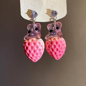 Sweet resin strawberry drop earrings featuring a purple bear and sparkling zirconia studs
