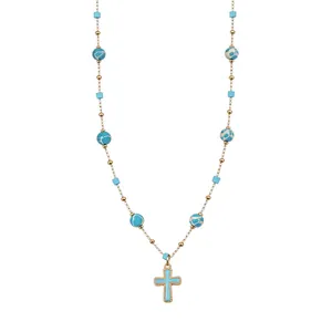 Elegante Vintage-Goldhalskette mit blauem Emaille-Kreuzanhänger und Türkisperlen