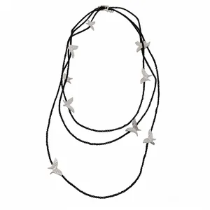 Elegant multi-layer black glass bead necklace with shimmering silver butterfly charms