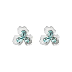 Elegant silver-tone flower stud earrings with aqua blue teardrop zircon stones.