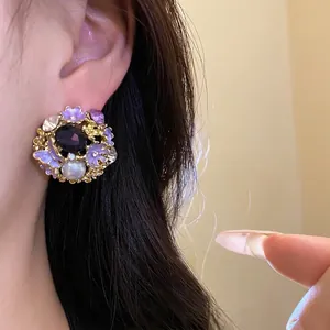 Elegant vintage floral stud earrings with purple rhinestones and pearls for women