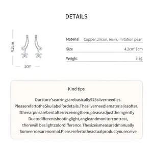Close-up detail showing the size and material specs of silver needle flower pearl earrings