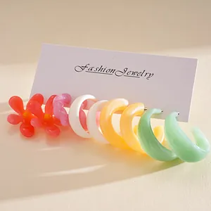 Colorful resin flower and C-shape hoop earring set on display card