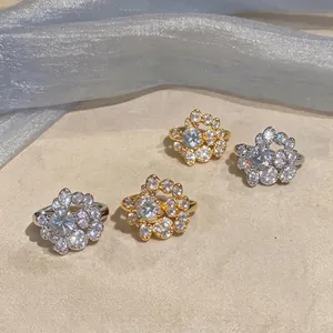 Elegant floral zircon clip-on earrings in gold and silver finish for non-pierced ears