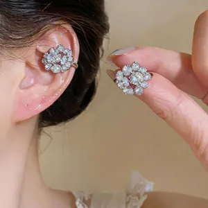 Elegant French style round zircon ear cuff for non-pierced ears shown on a model