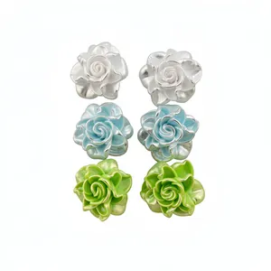 Set of six resin rose flower stud earrings in white blue and green with silver pins