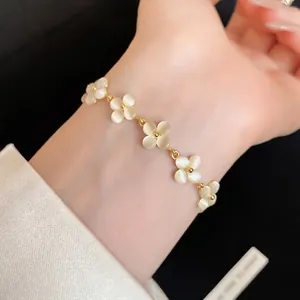 Elegant French style cat's eye stone flower bracelet with gold plating for women