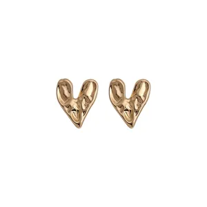 Minimalist crinkled heart-shaped gold stud earrings with a vintage metallic texture.