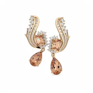 Eleganti orecchini vintage con zirconi champagne e montatura geometrica placcata oro