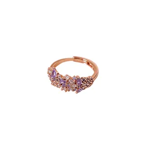Exquisite rose gold adjustable ring featuring irregular purple and clear zircon clusters.