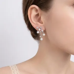 Sweet star and pearl drop earrings with sparkling rhinestones in a silver finish