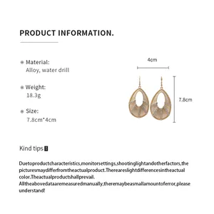 Detailed product information for gold-colored hollow teardrop earrings with water drill accents