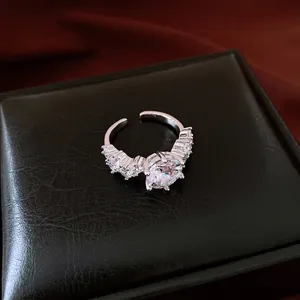Elegant silver open ring featuring vintage zircon and geometric crystal accents on box