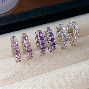 Elegant Korean style sparkling cubic zirconia hoop earrings displayed in a jewelry box