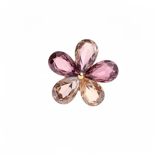 Elegant crystal flower open ring with multi-colored pear-shaped petals in gold tone.