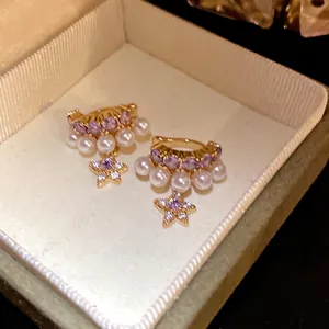Clips d'oreilles dorés en zircon avec perles blanches et étoiles pour oreilles non percées