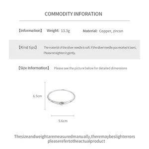 Infographic showing dimensions, weight and material of the zircon geometric bangle.