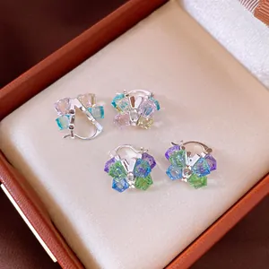 Detailed view of colorful square crystal hoop earrings presented in a gift box.