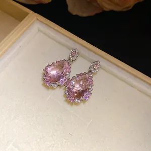 Elegant pear-shaped pink zirconia drop earrings with a sparkling crystal halo detail