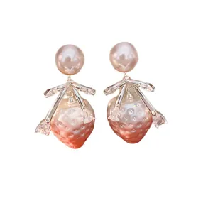 Sweet strawberry shaped drop earrings featuring pink pearls and sparkling marquise crystals