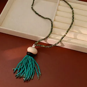 Elegant vintage ethnic style beaded necklace with long turquoise resin tassel for women