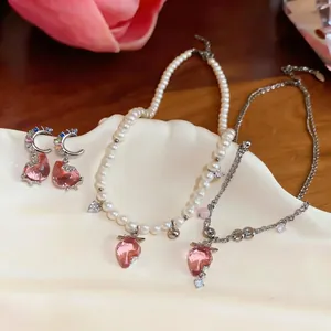 Sweet French style pearl necklace with pink resin strawberry pendant and earrings.