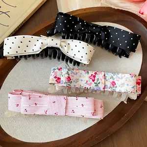 Elegant fabric bow hair clips set with polka dots and floral patterns