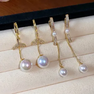 Elegant luxury 18K gold plated fish tail and tassel pearl earrings with zircon inlay