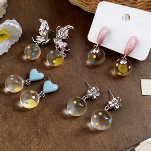 Silver needle drop oil earrings with heart, butterfly and flower dot glass balls