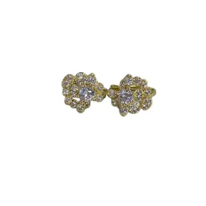 Exquisite gold-plated huggie hoop earrings featuring sparkling cubic zirconia flower cluster