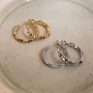 French retro geometric faceted hoop earrings in gold and silver finish for women
