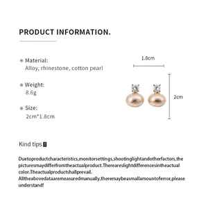 Macro detail of French retro cotton pearl earrings showing zircon and dimensions