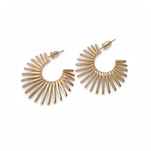 Elegant gold geometric C-shaped sunburst stud earrings featuring high-shine metallic finish