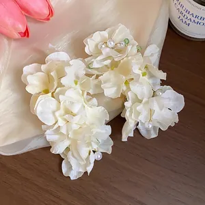 Elegant cream fabric flower hair clip with pearls and exquisite duckbill design