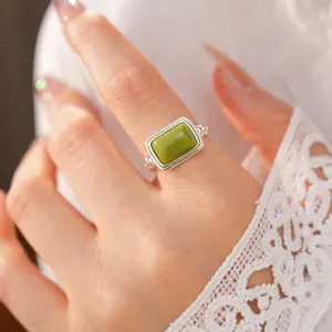 Elegant minimalist green square resin open ring for women on model hand with lace
