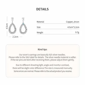 Detail view of elegant teardrop zircon earrings featuring 4.5cm length and hollow design