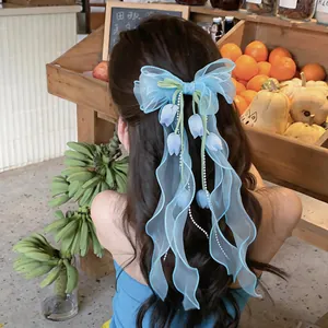 Fermaglio per capelli a fiocco blu in chiffon con pendenti a tulipano e perle